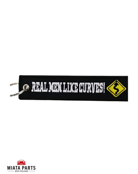 Real Men Like Curves Keychain