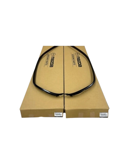 Rotary Parts NZ genuine Mazda RX7 FD front door drip moulding set in original cardboard packaging